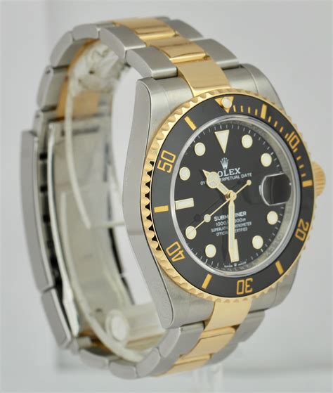 rolex gold black face|Introducing The Rolex Submariner Date In 41mm (All Seven.